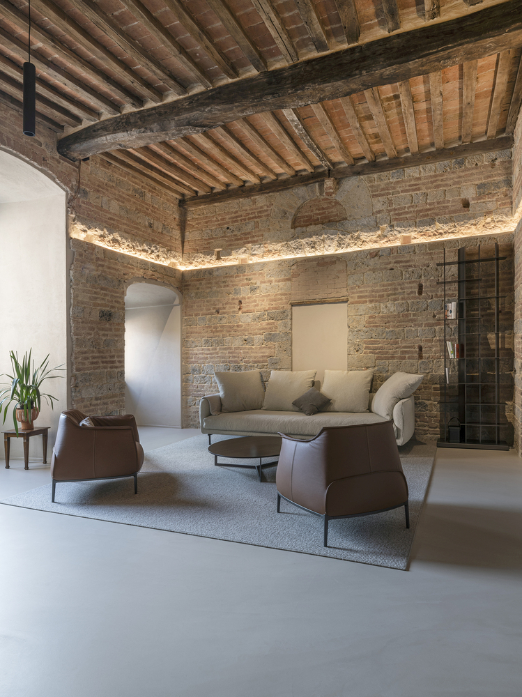 Minimalist Home Inside a Medieval Tower in Siena leather seat