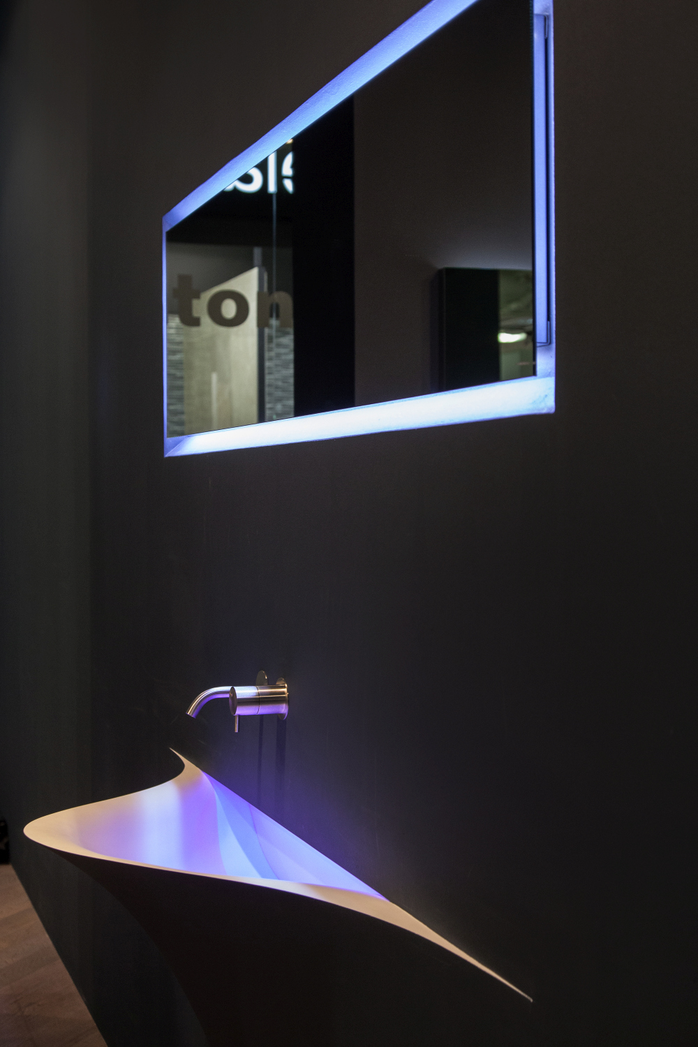 Futuristic Sink with Sculptural Design and LED Mirror