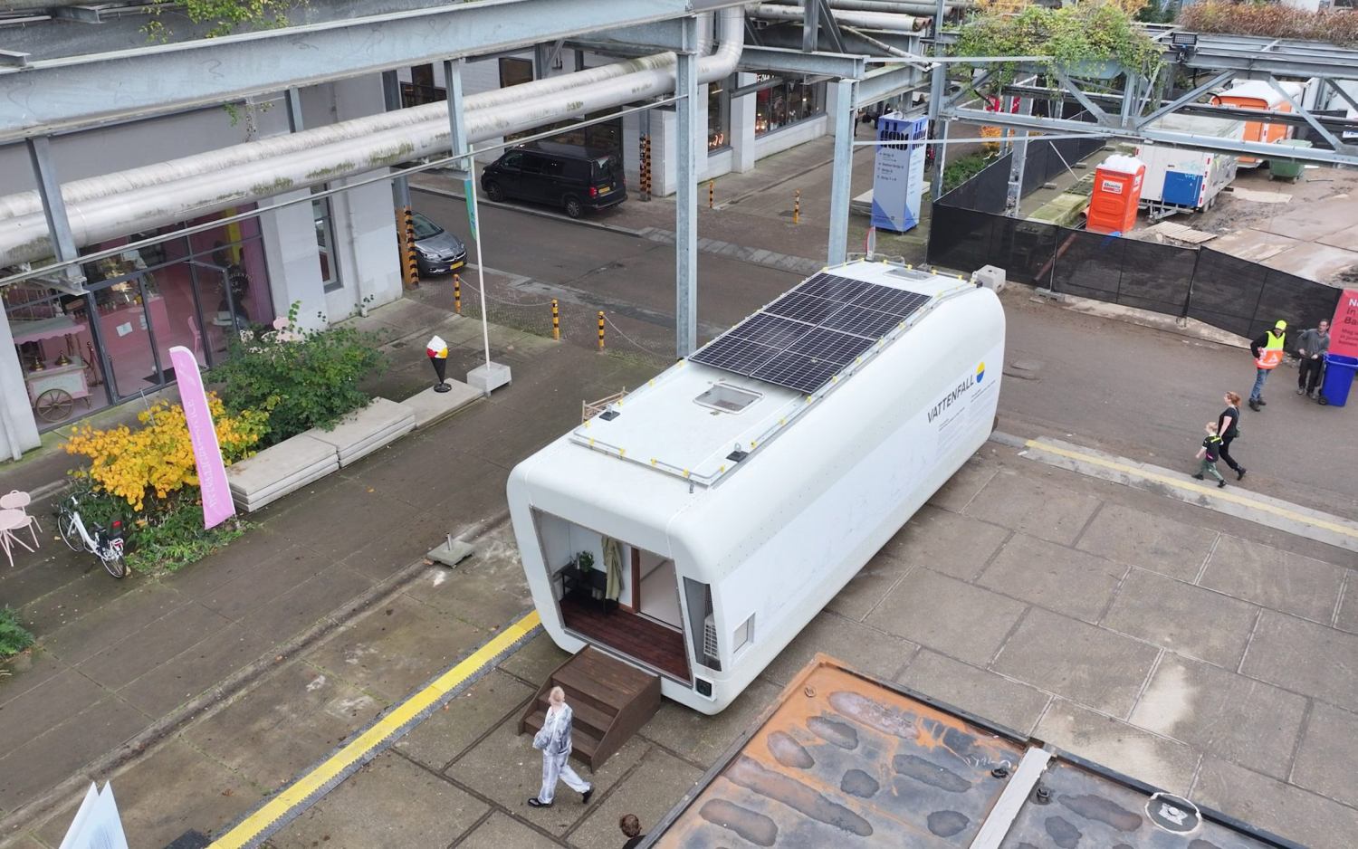 House inside a wind turbine solar panels